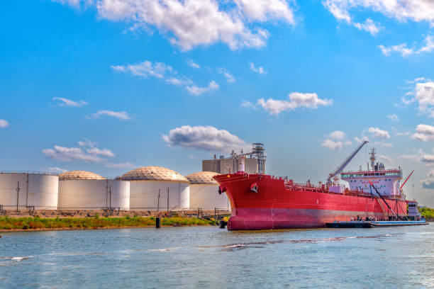 A large tanker ship moored in port in Houston, Texas on a summer morning.