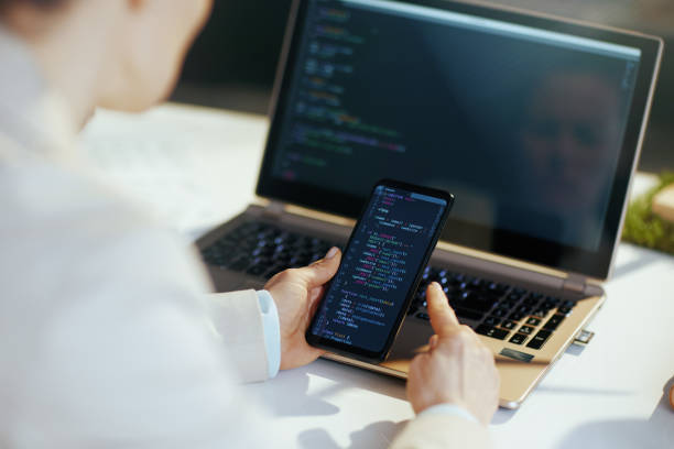 istock Seen from behind modern woman making cyber security maintenance 1635794879
