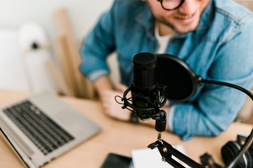 black headset with microphone, on white background, isolated