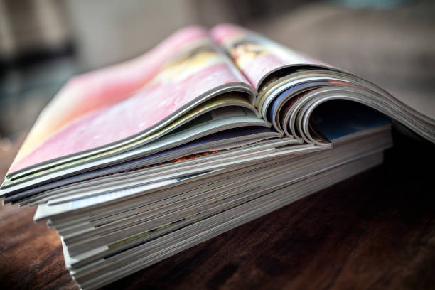 Magazine, brochure or catalogue on table end on background