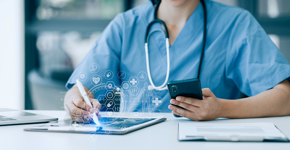 Medical Doctor Using Digital Smartphone, Medical Digital Technology and Healthcare Concept.