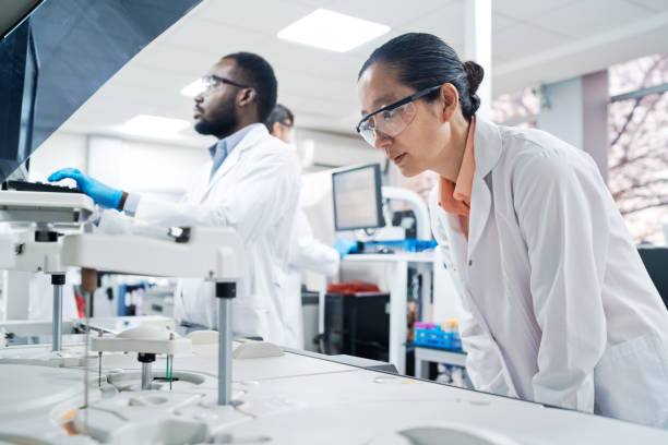 istock Female healthcare worker analyzing medical sample in laboratory 1635825162