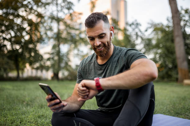 Free Stock Photo of Man interacting with smartwatch | Download Free ...