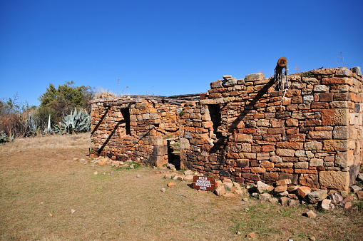 Thaba Bosiu plateau, Phuthiatsana Valley, Lesotho: 19th century ruins of the residence of King Moshoeshoe I, the first king of Lesotho - Moshoeshoe I (1786-1870) was born in Menkhoaneng, in the north of what later became Lesotho - At the age of 34, Moshoeshoe formed his own clan and became its supreme chief, equipping his forces with firearms and horses - In 1843, Moshoeshoe and the Briton George Thomas Napier signed the Napier Treaty, which confirmed Basotho possession of the western frontier. Moshoeshoe was thus recognized for the first time by the European powers in the region as the leader of the Basotho. Moshoeshoe died shortly after the 1868 agreement placing his nation under British protectorate, in 1870. The area is in the tentative Unesco world heritage list.