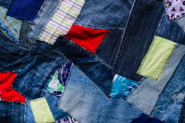 istock patchwork fragment from shreds of denim close-up 1635903743