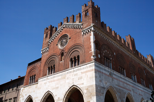 Piacenza, Italy - June 24, 2023: Piacenza, Emilia-Romagna, Italy: the medieval palace known as \