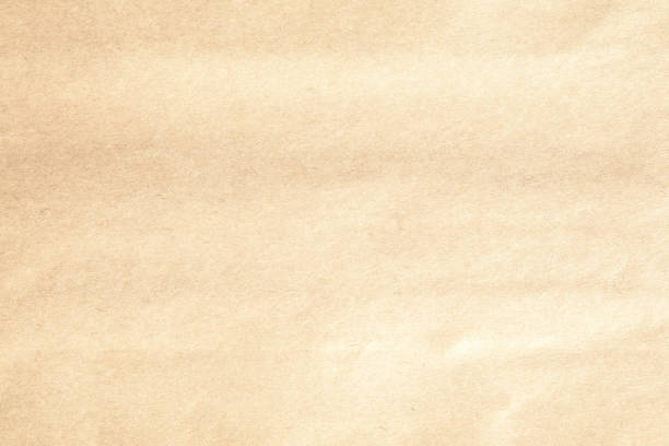 istock Creased kraft brown paper texture 1635925965