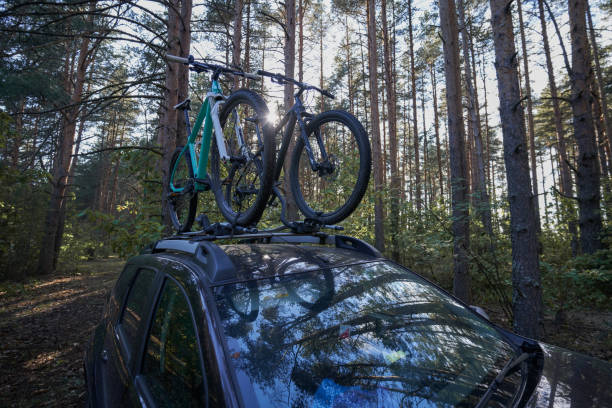 istock Car with two bicycles mounted to the roof 1635933943