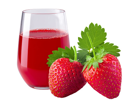 Fresh strawberries and a glass of strawberry juice isolated on a white background.