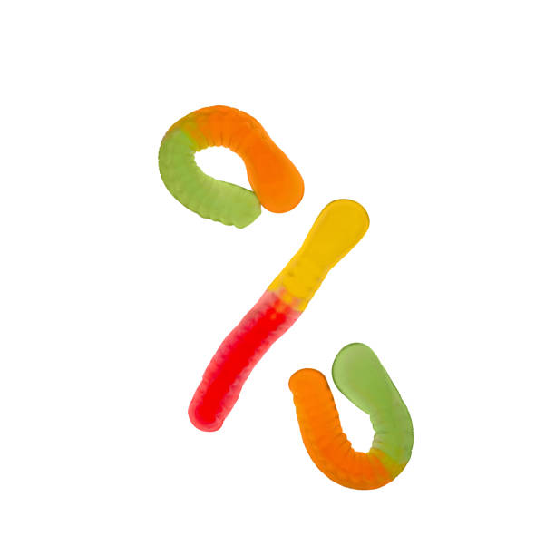 istock Percent sign composed of gummy worms 1635973501