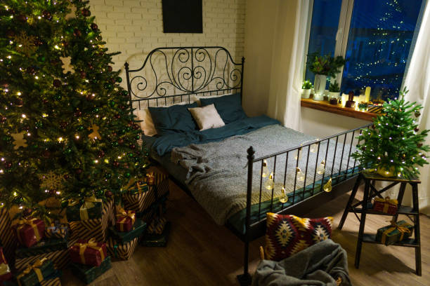 istock Cozy bedroom interior with winter Christmas decorations 1636010207