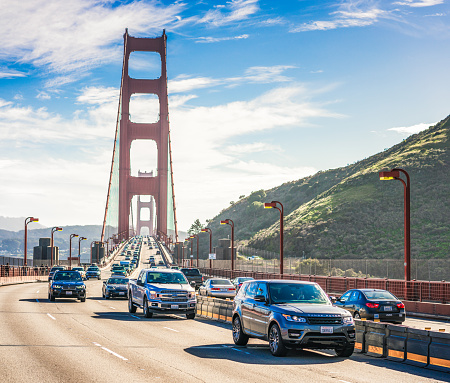 San Francisco, USA - Traffic crossing the Golden Gate Bridge on a sunny day in winter.