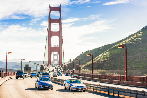 San Francisco, USA - People driving across the Golden Gate Bridge in California..