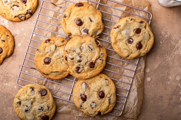 istock Chocolate chip cookies with flaky salt on a cooling rack 1636017071