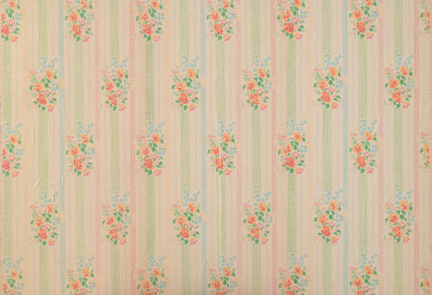 istock Old wallpaper on the wall. Old wallpaper for texture or background. 1636067857