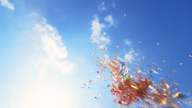 SLO MO LD Colourful confetti being thrown into the air
