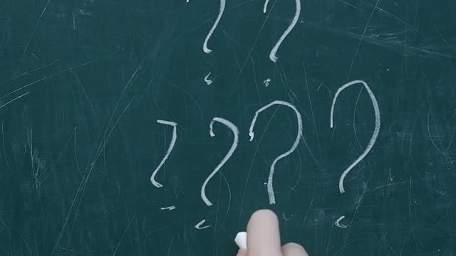 Questions write on  chalkboard, back to school