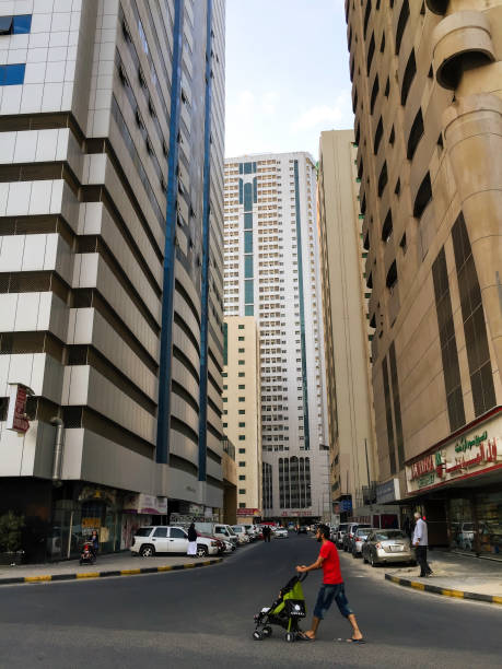 Abu Dhabi, UAE - January 3, 2025: A detailed view of a modern high-rise building facade showcasing contemporary architectural design.