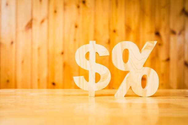 istock Dollar model and Percentage model on the table. Concepts for methods, systems of raising or lowering Fed interest rates to correct inflation concepts. 1636147436