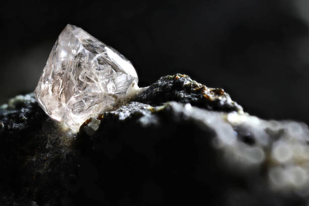 istock natural diamond nestled in kimberlite 1636186128