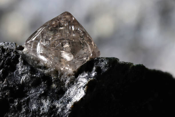 istock natural diamond nestled in kimberlite 1636186395