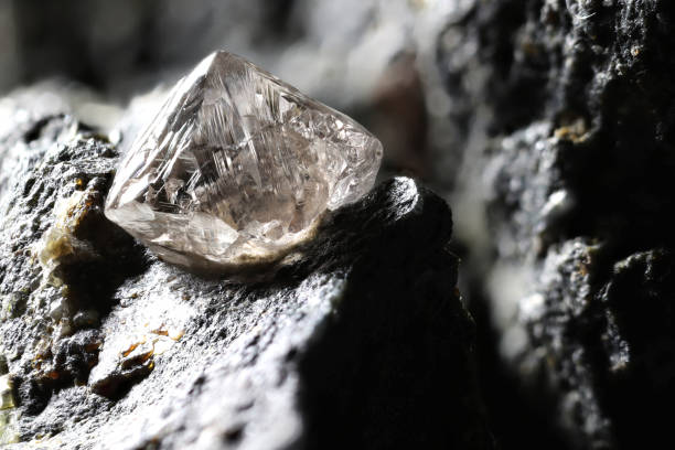 istock natural diamond nestled in kimberlite 1636186679