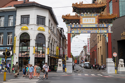 Antwerp, Belgium, August 22, 2023; Decorated chinese gate at the entrance of Chinatown in the center of Antwerp.