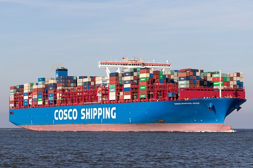 Cuxhaven, Germany - October 31, 2019: container ship Cosco Shipping Aries on the river Elbe