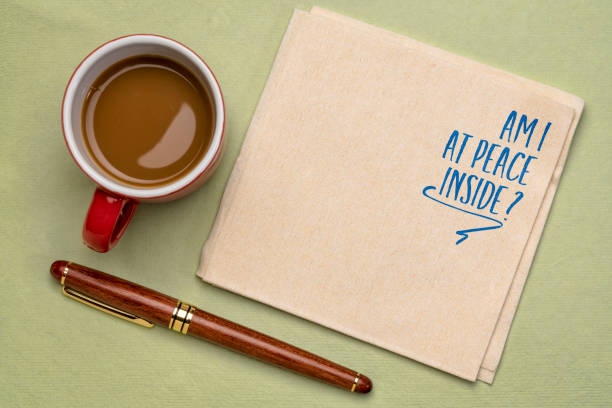 istock Am I at peace inside? Self reflection question on a napkin with coffee. Mindfulness and personal development concept. 1636283535
