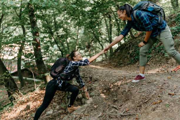 istock Two young friends embark on an exciting hiking journey 1636284607