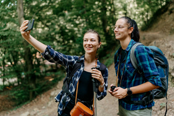 istock Two friends take a selfie during their hike 1636286200