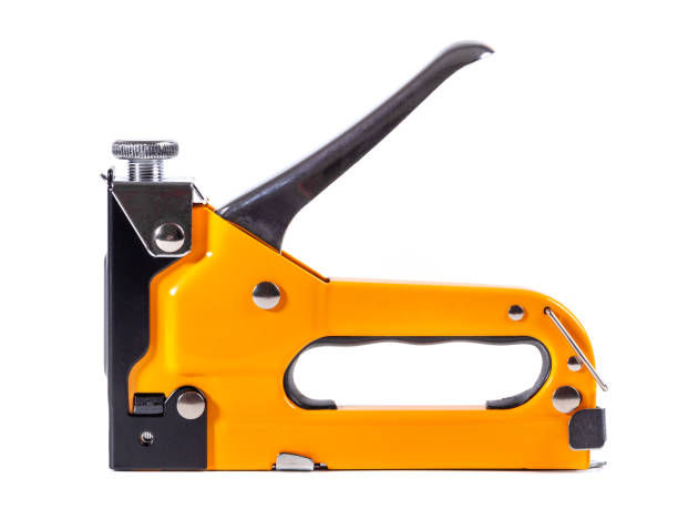 istock Industrial stapler for driving staples on a white background 1636288932