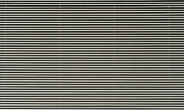 istock Close-up of an aluminium shutter grille 1636358150
