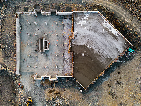 Aerial view of ground level parking garage foundation.