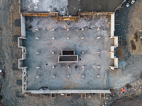 Aerial view of ground level parking garage foundation.