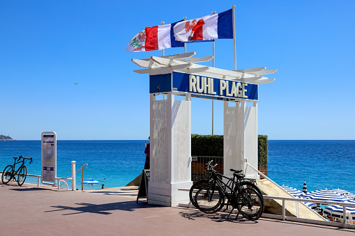 Nice, France - May 3, 2023: Some beaches along the Mediterranean Sea are marked and fenced. Here you can see such way down from the Promenade des Anglais to such a beach