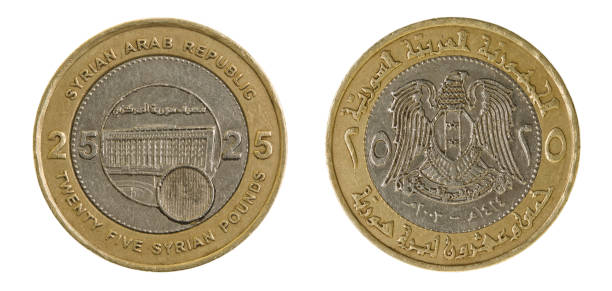istock Single used Syrian 25 Pounds coin on white, both sides 163638235