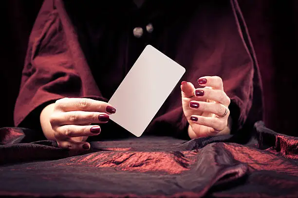 fortune teller with with blank tarot card - easily add your own message or design.