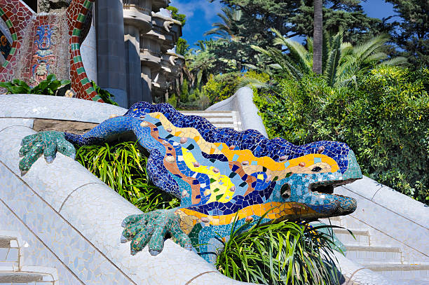 Mosaic dragon, Park Gwell, Barcelona In Gaudi's Park Guell, Barcelona, a UNESCO World Heritage Centre, a mosaic dragon which has become the symbol of Barcelona. antoni gaudí stock pictures, royalty-free photos & images