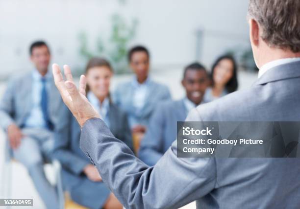 Hes Caught Their Attention Stock Photo - Download Image Now - Human Hand, Presentation - Speech, Suit