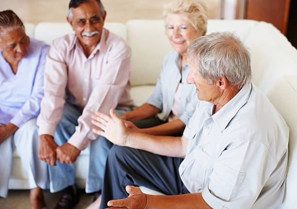 istock Senior people in conversation with each other 163640673