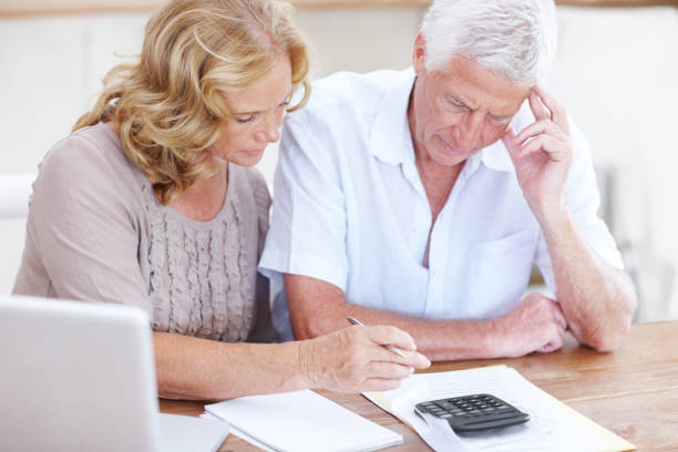 istock Trying to budget their monthly expenses 163641076