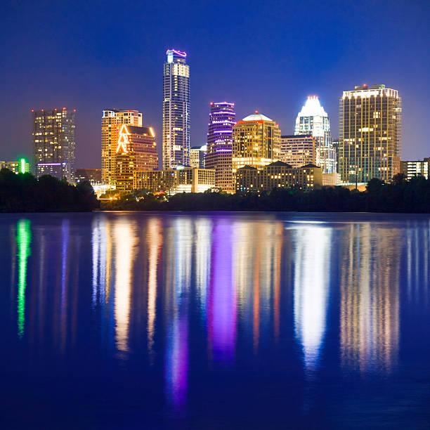 istock Austin skyline cityscape at night reflected in Ladybird Lake 163641373