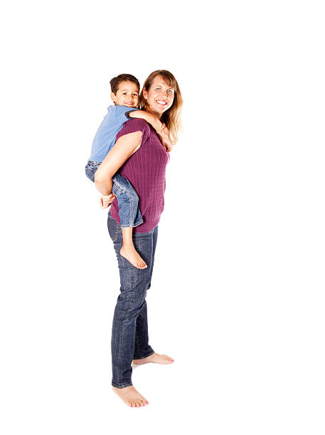 A mother carrying her baby in a sling