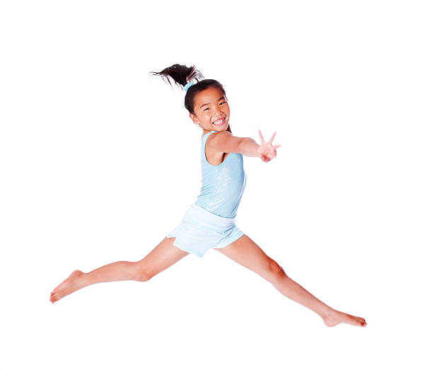 istock Young Asian Gymnast Split Jump 163641411