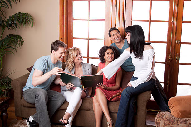 istock Friends Sharing a Photo Album 163641450