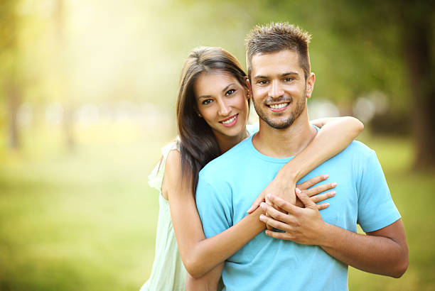 istock Happy couple in park. 163641989