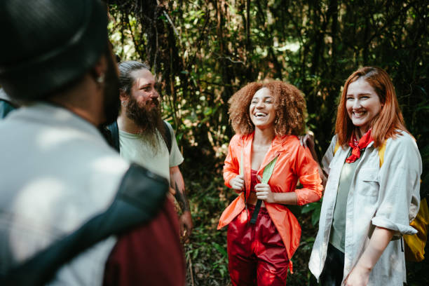 istock Friends talking during a hiking on the forest 1636439216