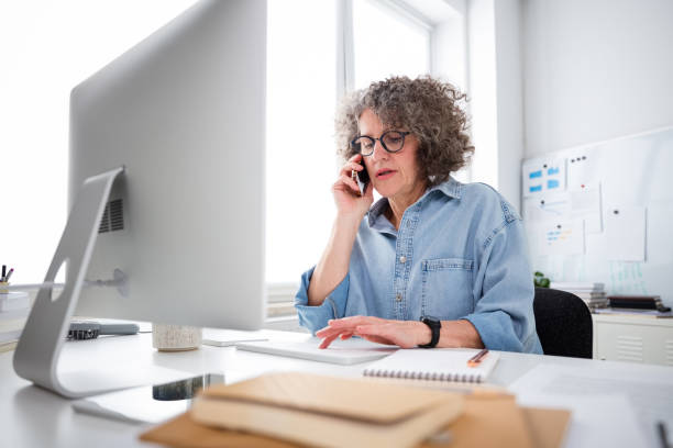 Mature woman working in the office