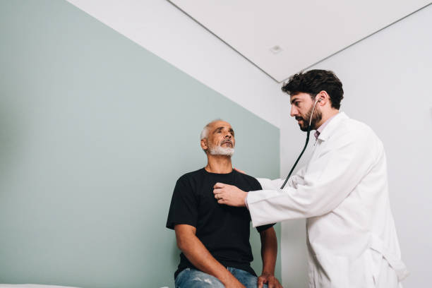 istock Doctor examining his patient on a doctor's office 1636474820